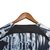 Camisa Olympia Treino 24/25 - Torcedor Nike Masculina - Preta com detalhes em azul e branco