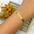 Pulseira Seta Banhada a Ouro – Minimalista e Sofisticada