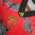 Camisa Retrô Manchester United Edição Especial Ano Novo Chinês 20/21 - Masculina Adidas - Vermelha com detalhes em preto e branco - Golden Gol Camisas