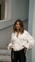 Blusa ideal para um visual sofisticado e fluido.