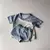 Conjunto de camiseta e shorts cores (it) - loja online