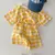 Conjunto de camiseta e shorts cores (it) na internet