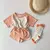 Conjunto de camiseta e shorts cores (it) - loja online