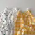 Conjunto de camiseta e shorts cores (it)