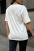 T-SHIRT ESTONADA AMOR AUTÊNTICO - OFF WHITE na internet