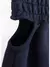 SHORT MOLETOM BOLSOS CUT OUT PERFUMARIA - Zóti Kids Moda Infantil