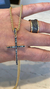 Pingente Cruz com Diamantes Negros na internet