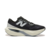 Vista lateral do New Balance FuelCell Rebel v4 Preto, destacando o design aerodinâmico.