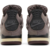 Detalhe da aba traseira do Air Jordan 4 Violet Ore, revelando a mensagem oculta da colaboração com A Ma Maniére.