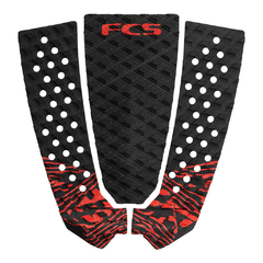 Modelo de deck FCS Pro Model Filipe Toledo, com design em preto e detalhes vermelhos, ideal para surfistas profissionais.