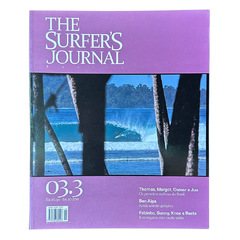 Revista The Surfer’s Journal Brasil 03.3 com capa de tubo azul entre pilares e matérias sobre pioneiros do surf, Ben Aipa e entrevistas com ícones do esporte.