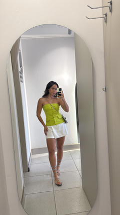 Short saia de tecido