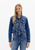 Jaqueta jeans trucker Lança Perfume na internet