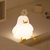 Luminária Infantil Abajur Siliconado Pato Florzinha Luz Quente - comprar online