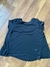 Remera negra UnderArmour espalda abierta