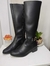 Bota montar con hebilla