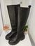 Bota negra estilo bucanera en internet