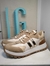 Zapatillas blancas con detalles en gamuza