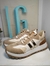 Zapatillas blancas con detalles en gamuza en internet