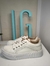 Zapatillas blancas con brillo en internet