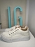 Zapatillas blancas con brillo