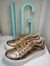 Zapatillas doradas en internet