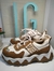 Zapatillas blancas con marron