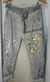 Pantalón gris Metalizado en plata y oro