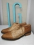 Botas marrones con dorado