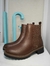 Botas marrones en internet