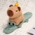 Peluche muñequera Capibara - Gitana