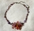 Oreades del Bosque: Collar con Orquídea esculpida y piedras en alambrismo - comprar en línea