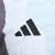 Camisa Real de Madrid Pré-jogo 25/26 - Torcedor Adidas Masculina - Branca com detalhes em laranja e preto e azul - CAMISAS DE FUTEBOL | Loja EuroBraza
