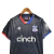 Camisa Crystal Palace III 23/24 - Torcedor Macron Masculina - Preta com detalhes em vermelho e azul - CAMISAS DE FUTEBOL | Loja EuroBraza