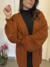 Cardigan aberto pompom na internet