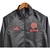 Jaqueta Corta-Vento Manchester United 23/24 - Masculina Adidas - Preta com detalhes em vermelho e azul na internet