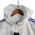 Imagem do Jaqueta Corta-Vento Real Madrid 21/22 - Masculina Adidas - Branca com detalhes em azul e amarelo
