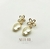 Brinco Flor Névoa (M) Banhado a Ouro 18K na internet