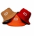 KIT 3 CHAPÉUS/BUCKETS PREMIUM UNISSEX _ CORES MARROM/CARAMELO, VERMELHA E LARANJA na internet