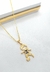 Colar com Pingente de Menino Jogando Bola Banhado a Ouro - comprar online