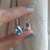Aros de topacio celeste natural y plata 925