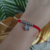 Pulsera hilo rojo con dije - Candy Accesorios