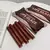 Conjunto de cinco esmaltes labiais de chocolate Mist batom fosco menina estudant - comprar online