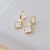 Argola Click Trevo - Branco - Banhado Ouro 18k - Antialérgico