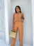 CONJUNTO COLETE E CALÇA SIMONE na internet