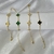 Pulseira TrevoBanhada a Ouro com Pingentes Florais Vazados 18k - Royal Company