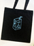Totebag jugo de me da lo mismo negro