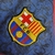 Camisa Barcelona Treino 23/24 - Torcedor Nike Masculina - Grená com detalhes em dourado e preto - loja online