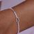 Pulseira Elos Brilhosos Detalhe Oval Central - Banho em Prata 925