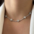 Colar Luxo Riviera Trevos Cravejados - Banho em Ródio Branco - comprar online